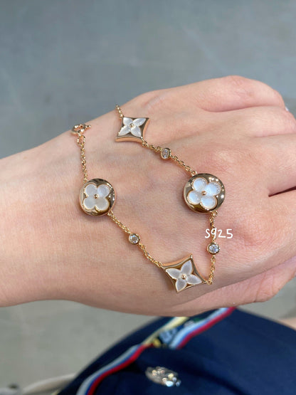 [Stellar Jewelry]STAR AND SUN 4 MOTIF WHITE MOP PINK GOLD BRACELET