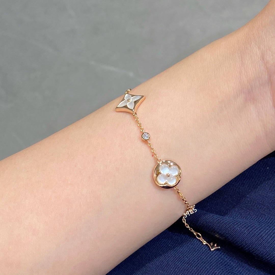[Stellar Jewelry]STAR AND SUN 4 MOTIF WHITE MOP PINK GOLD BRACELET