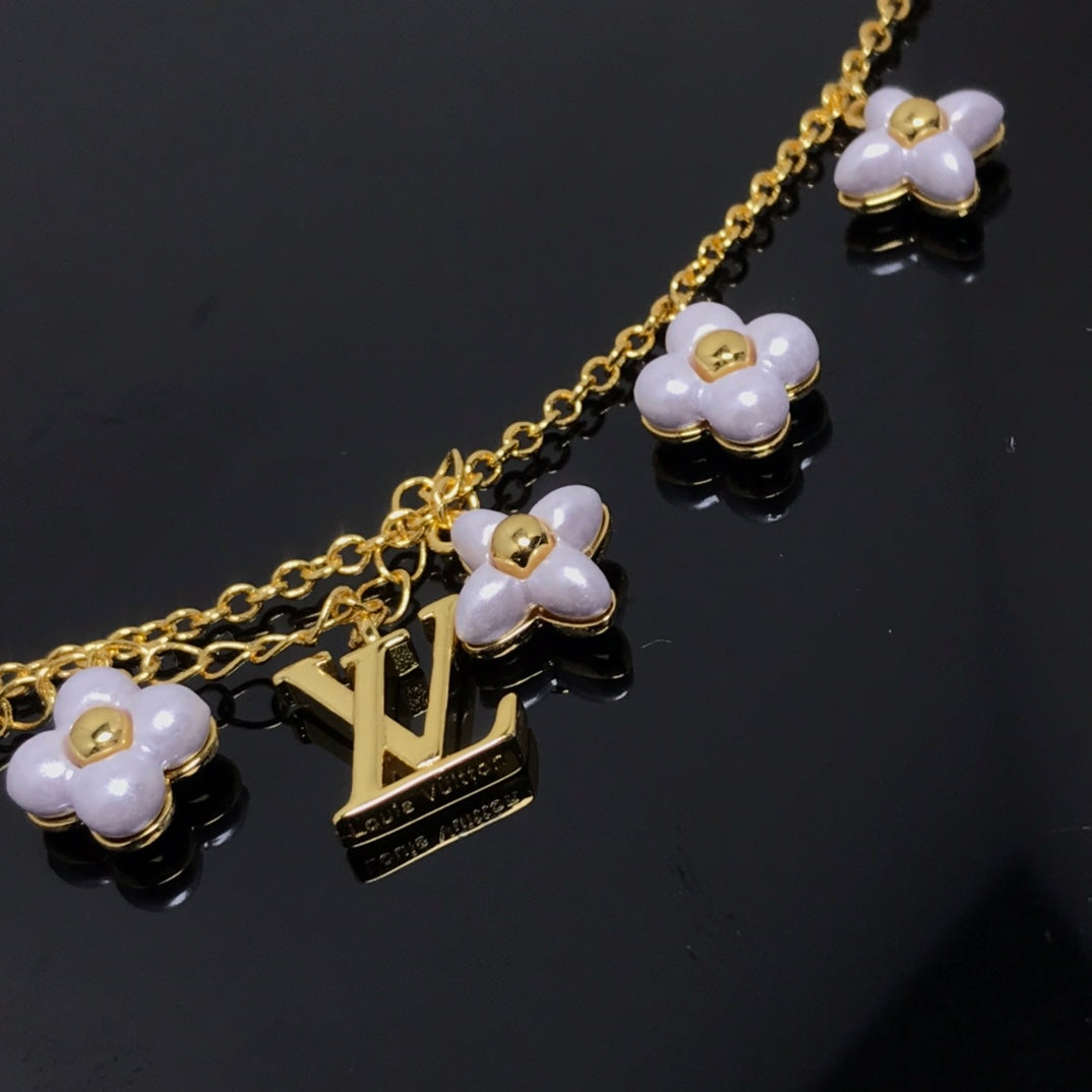 [Stellar Jewelry]LOGO 6 MOTIF STAR AND SUN GOLD BRACELET